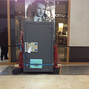 Delivering a safe to a mezzanine mall storefront